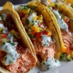 Mango-Peach Salsa Salmon Tacos with Cilantro-Lime Crema