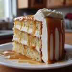Marzipan Cake with Cream Cheese Frosting and Dulce de Leche Drip