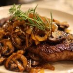 Ribeye Steak with Caramelized Onions and Mushrooms