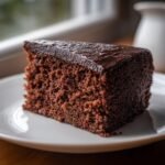 Nahaufnahme eines saftigen St&uuml;cks Schokoladenkuchen, das perfekte Chocolate Delight.